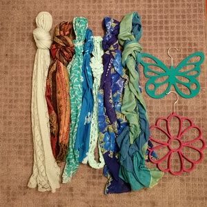 7 scarves and 2 scarf hangers